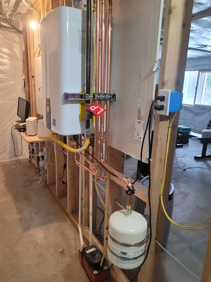 Licensed plumber repairing a kitchen sink in Glasgow