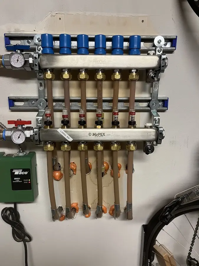 Plumber performing Leak Detection at a residential property in Glasgow